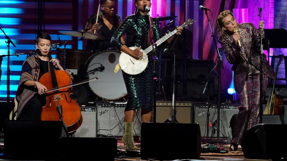 Larissa Maestro, left, Allison Russell, center, and Brandi Carlile, right, perform at the Americana Honors & Awards show Wednesday, Sept. 14, 2022, in Nashville, Tenn. (AP Photo/Mark Humphrey)