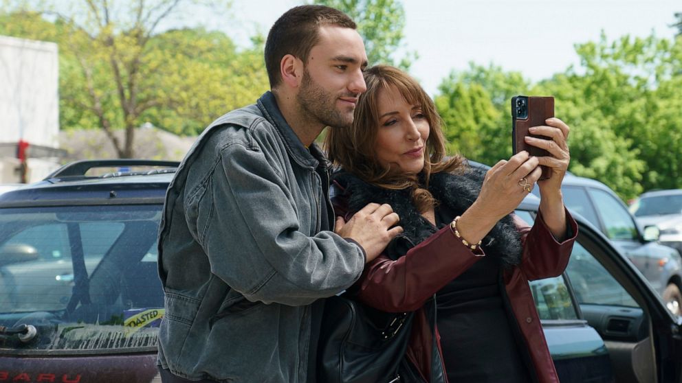 This image released by Hulu shows Jackson White, left, and Katey Sagal in a scene from "Tell Me Lies." (Josh Stringer/Hulu via AP)