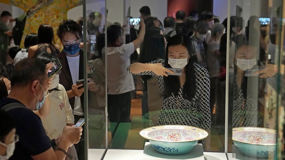 Visitors tour the Hong Kong Palace Museum during the first day open to public in Hong Kong, Sunday, July 3, 2022. It showcases more than 900 Chinese artefacts, loaned from the long-established Palace Museum in Beijing, home to works of art representi