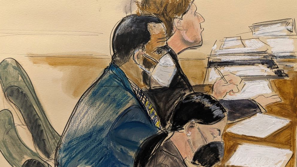In this courtroom artist's sketch R. Kelly, left, listens during his trial in New York, Thursday, Aug. 26, 2021. The 54-year-old Kelly has repeatedly denied accusations that he preyed on several alleged victims during a 30-year career highlighted by 