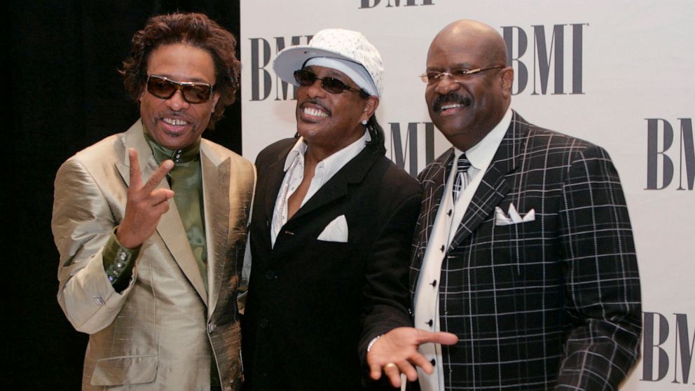 FILE - Members of The GAP Band, brothers Robert Wilson, from left, Charlie Wilson and Ronnie Wilson pose for photographers appear at the 2005 BMI Urban Music Awards in Miami Beach, Fla., on Aug. 26, 2005. Ronnie Wilson, multi-instrumentalist and foun