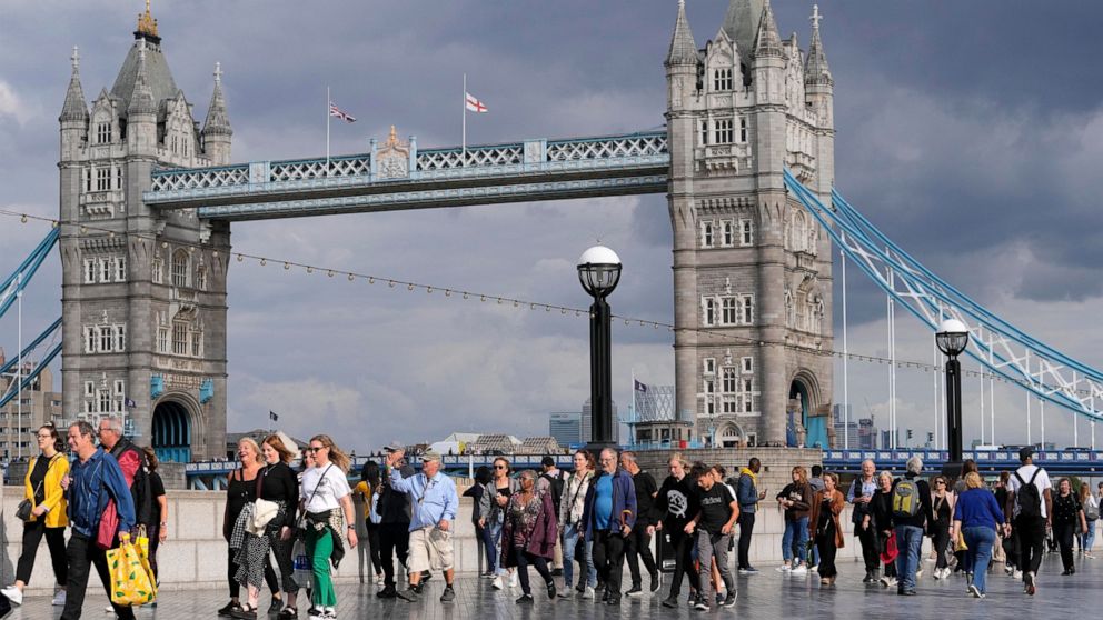 People queue at the start of the more than four miles long line, near Tower Bridge, to pay their respect to the late Queen Elizabeth II during the Lying-in State, in Westminster Hall in London, Thursday, Sept. 15, 2022. The Queen will lie in state in