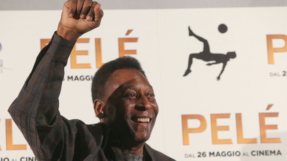 FILE - Brazilian soccer legend Edson Arantes Do Nascimiento better known as 'Pele', gestures during a photocall of the movie 'Pele', in Milan, Italy, Wednesday, May 25, 2016. Pelé, the Brazilian king of soccer who won a record three World Cups and be