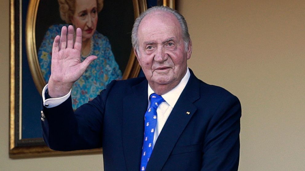 FILE - In this Sunday, June 2, 2019 file photo, Spain's former King Juan Carlos waves during a bullfight at the bullring in Aranjuez, Madrid, Spain. Spanish Supreme Court prosecutors have taken over a new investigation into the financial activities o