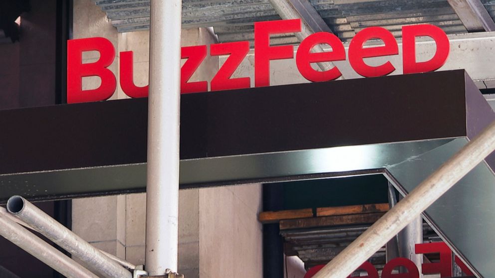 FILE - The entrance to BuzzFeed in New York is seen on Nov. 19, 2020. Buzzfeed announced that it has laid off 45 reporters, editors and producers from the newly acquired HuffPost. The dismissals come three weeks after Buzzfeed acquired HuffPost from 