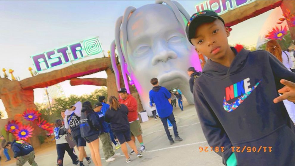 FILE - This photo provided by Taylor Blount shows Ezra Blount, 9, posing outside the Astroworld music festival in Houston on Nov. 5, 2021. Ezra is the youngest person to die from injuries sustained during a crowd surge at the Astroworld music festiva