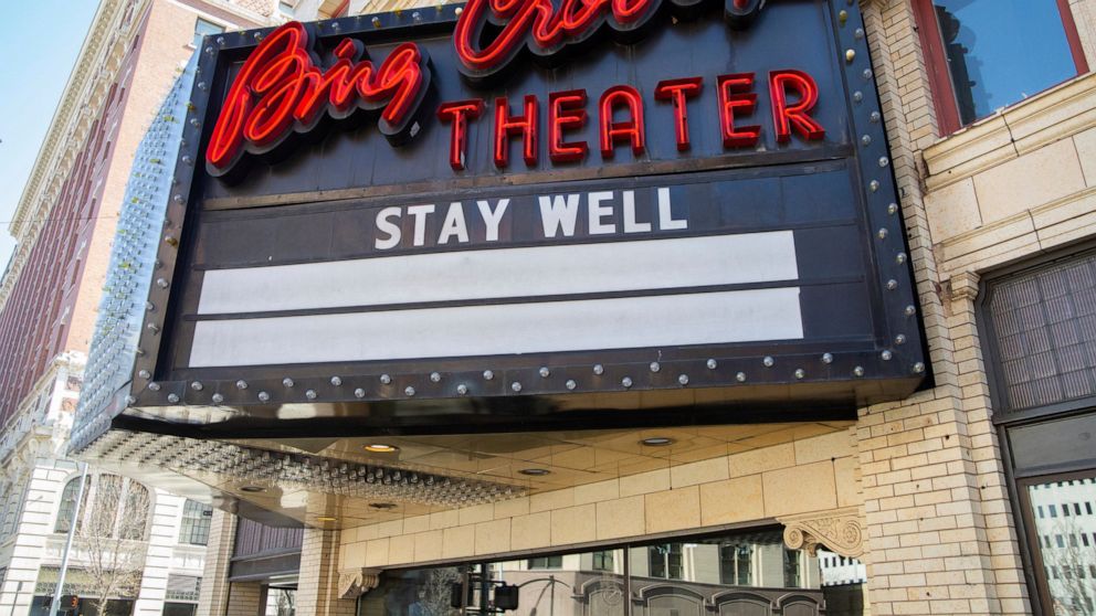 One side of the marquee of the Bing Crosby Theater reads "stay well" Monday, March 16, 2020, in downtown Spokane, Wash. On Sunday, Gov. Jay Inslee ordered gatherings of 50 people or more to stop; including entertainment venues. (Libby Kamrowski/The S