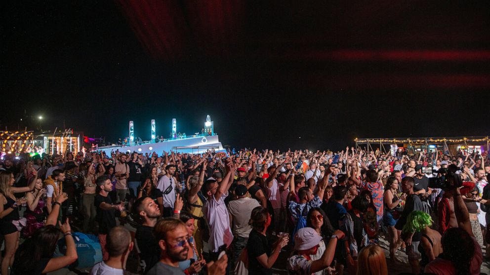 Music fans flock to Albania’s beach festival despite virus