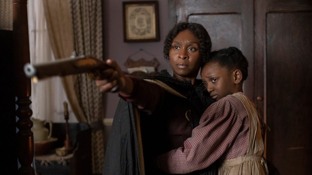 This image released by Focus Features shows Cynthia Erivo as Harriet Tubman, left, and Aria Brooks as Anger in a scene from "Harriet." (Glen Wilson/Focus Features via AP)