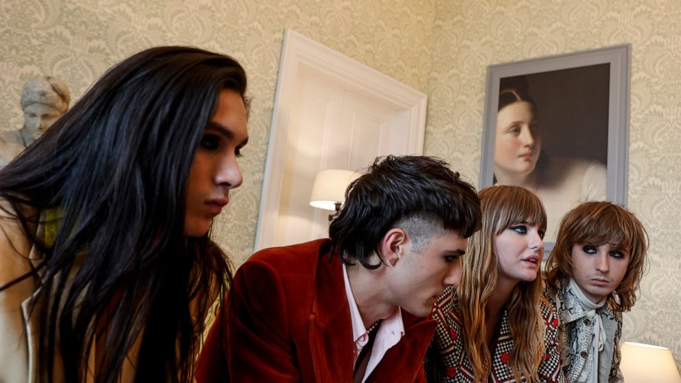 From left, Ethan Torchio, Damiano David, Victoria De Angelis and Thomas Raggi, of Italian band Maneskin, winners of the Eurovision Song Contest in May, are interviewed by the Associated Press at a hotel in Rome, Tuesday, July 27, 2021. (AP Photo/Ricc
