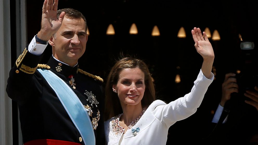 FILE - Spain's King Felipe VI and his wife Spain's Queen Letizia wave to the crowd on a balcony of the Royal Palace in Madrid, Spain, on Thursday, June 19, 2014. Spain’s Queen Letizia turned 50 on Thursday, Sept. 15, 2022. Spain is taking the opportu