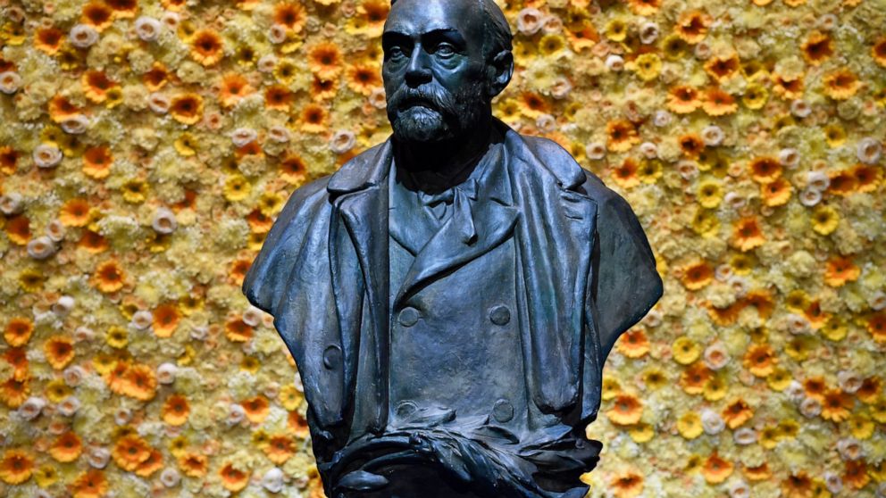 FILE - In this Monday, Dec. 10, 2018 file photo, a bust of the Nobel Prize founder, Alfred Nobel on display at the Concert Hall during the Nobel Prize award ceremony in Stockholm. Controversy stalks the Nobel prizes for peace and literature in a way 