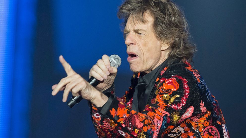 FILE - In this Oct. 22, 2017 file photo, Mick Jagger of the Rolling Stones performs during the concert of their 'No Filter' Europe Tour 2017 at U Arena in Nanterre, outside Paris, France. The Rolling Stones are postponing their latest tour so Jagger 