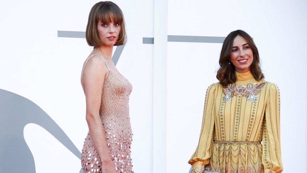 Actress Maya Hawke, left, and director Gia Coppola pose for photographers upon arrival at the premiere for the film 'Mainstream' during the 77th edition of the Venice Film Festival in Venice, Italy, Saturday, Sept. 5, 2020. (Photo by Joel C Ryan/Invi
