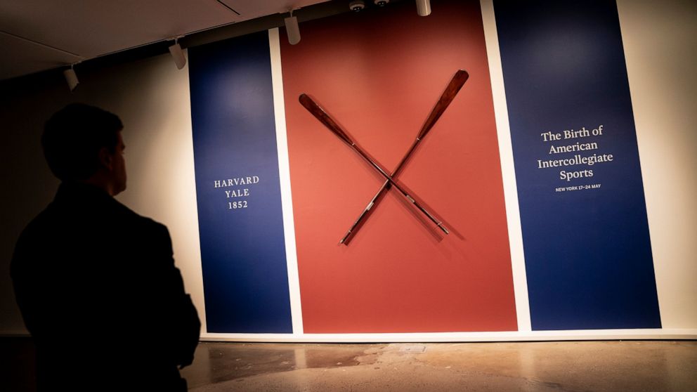 The Harvard-Yale Regatta 1852 Trophy Oars are displayed before an auction, Thursday, April 21, 2022, at Sotheby's in the Manhattan borough of New York. Sotheby's estimates the oars value between three and five million dollars. The oars were awarded t