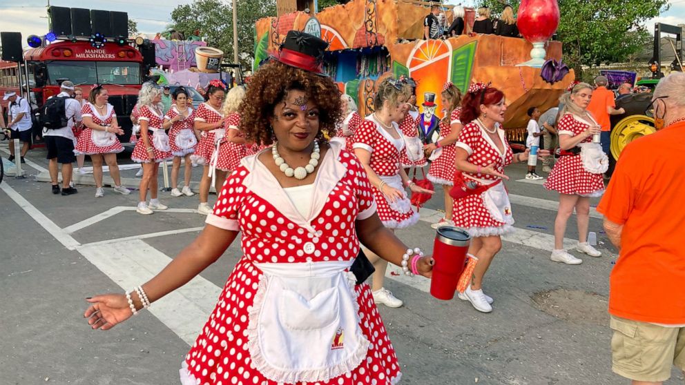 Members of the Mande Milkshakes, a dancing group in New Orleans, take part in the Krewe of Boo parade on Saturday, Oct. 23, 2021, in New Orleans. (AP Photo/Rebecca Santana)