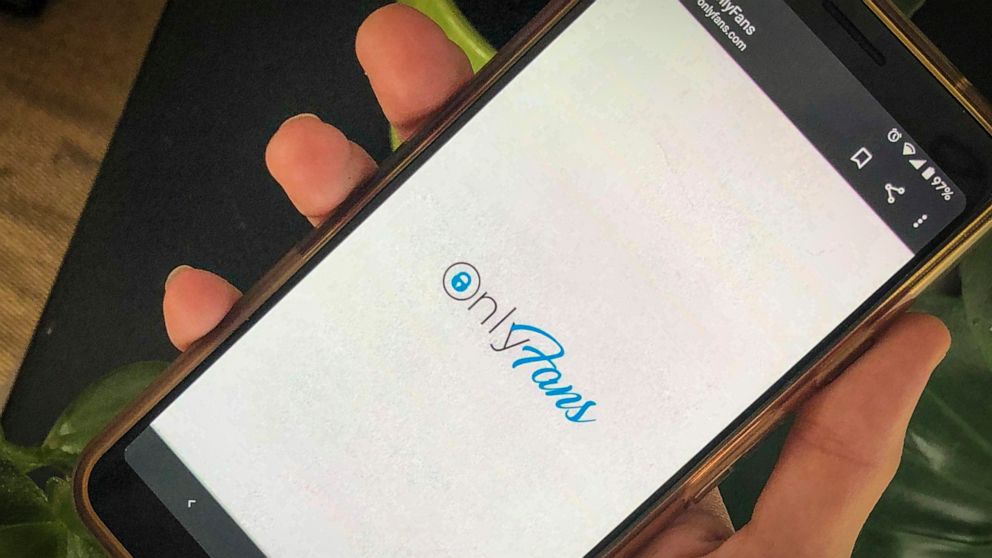 This photo shows a phone app for OnlyFans, a site where fans pay creators for their photos and videos, Thursday Aug. 19, 2021. A spokesperson says the site will ban "sexually explicit" starting Oct. 1 after requests from banking partners. (AP Photo/T