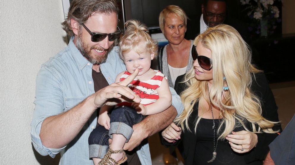 Jessica Simpson arrives at Los Angeles International Airport, with boyfriend Eric Johnson and daughter Maxwell in tow, May 5, 2013 in Los Angeles.