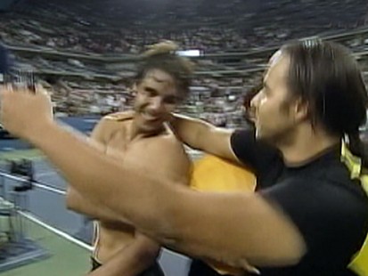 VIDEO: Rafael Nadal almost gets a surprise kiss from a male spectator at the U.S. Open.