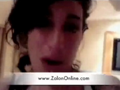 Video: Singing Amy Winehouse turns to hip-hop raps.