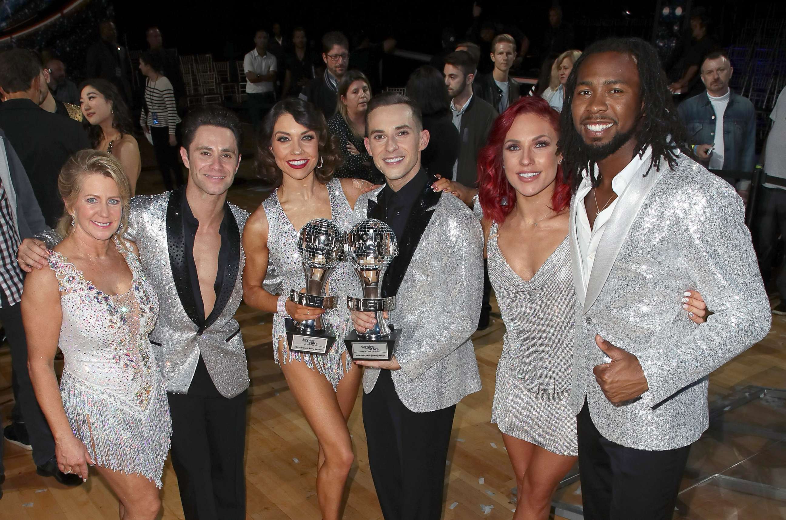 PHOTO: (L-R) Tonya Harding, Sasha Farber, Mirrorball trophy winners Jenna Johnson and Adam Rippon, Sharna Burgess and Josh Norman pose at ABC's "Dancing with the Stars: Athletes" Season 26 - Finale, May 21, 2018, in Los Angeles.