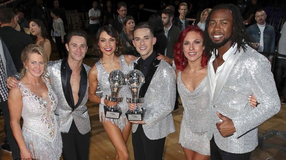 PHOTO: (L-R) Tonya Harding, Sasha Farber, Mirrorball trophy winners Jenna Johnson and Adam Rippon, Sharna Burgess and Josh Norman pose at ABC's "Dancing with the Stars: Athletes" Season 26 - Finale, May 21, 2018, in Los Angeles.