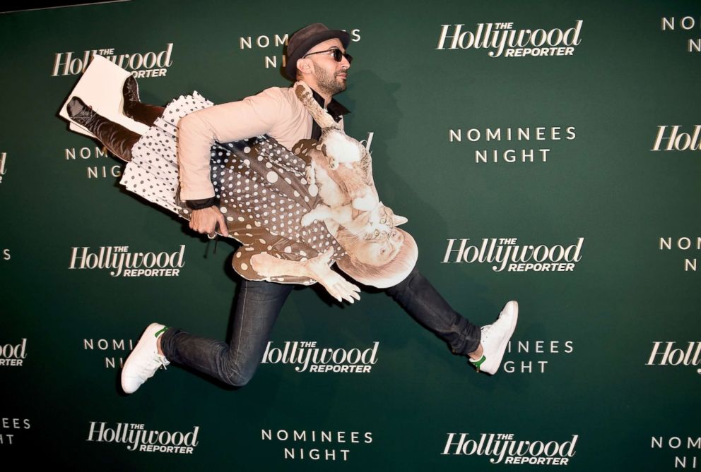 PHOTO: JR poses with a cutout of French filmmaker Agnes Varda at The Hollywood Reporter 6th annual nominees night at CUT, Feb. 5, 2018, in Beverly Hills, Calif.