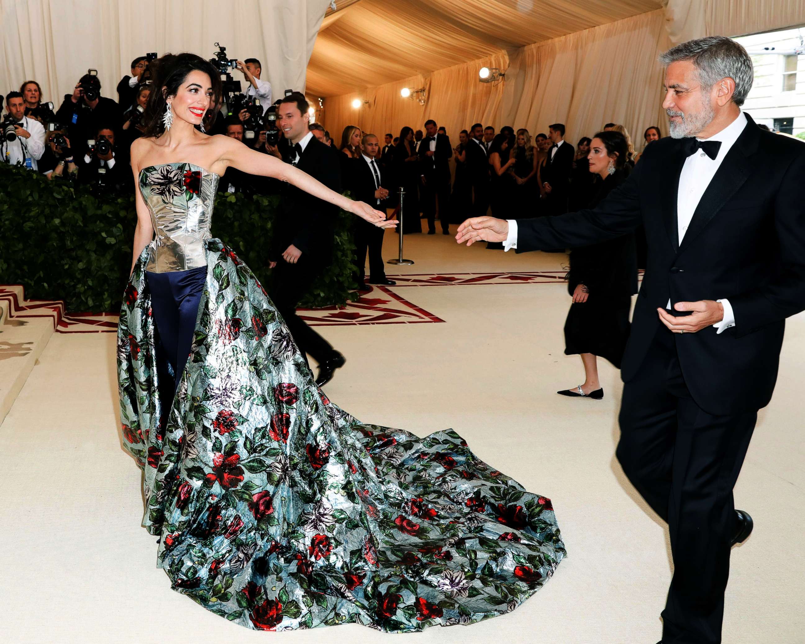 PHOTO: Amal Clooney and George Clooney arrive at The Metropolitan Museum of Art's Costume Institute Benefit celebrating the opening of Heavenly Bodies: Fashion and the Catholic Imagination, New York, May 7, 2018.