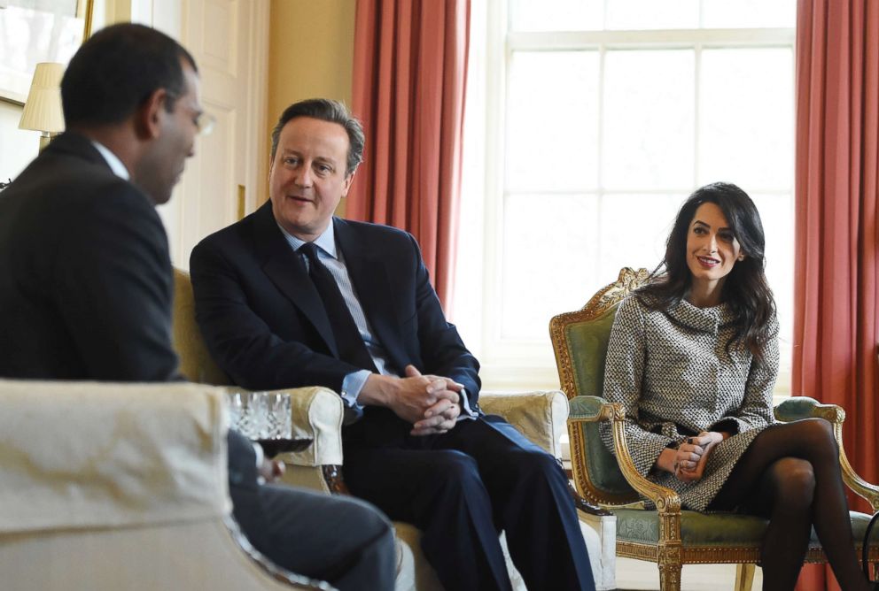 PHOTO: Lawyer Amal Clooney sits with Britain's Prime Minister David Cameron and the former Maldives President Mohamed Nasheed in 10 Downing Street, in London, Jan. 23, 2016.