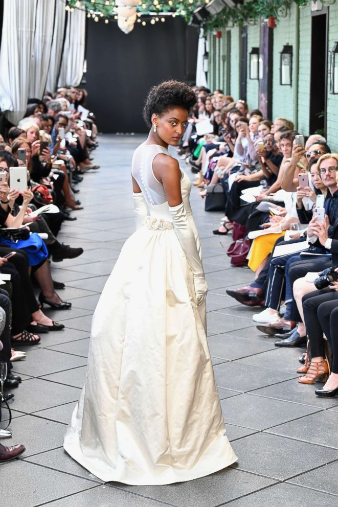 PHOTO: A model walks the runway at the Amsale Tribute Spring 2019 runway show at Gramercy Park Hotel on April 13, 2018 in New York City.