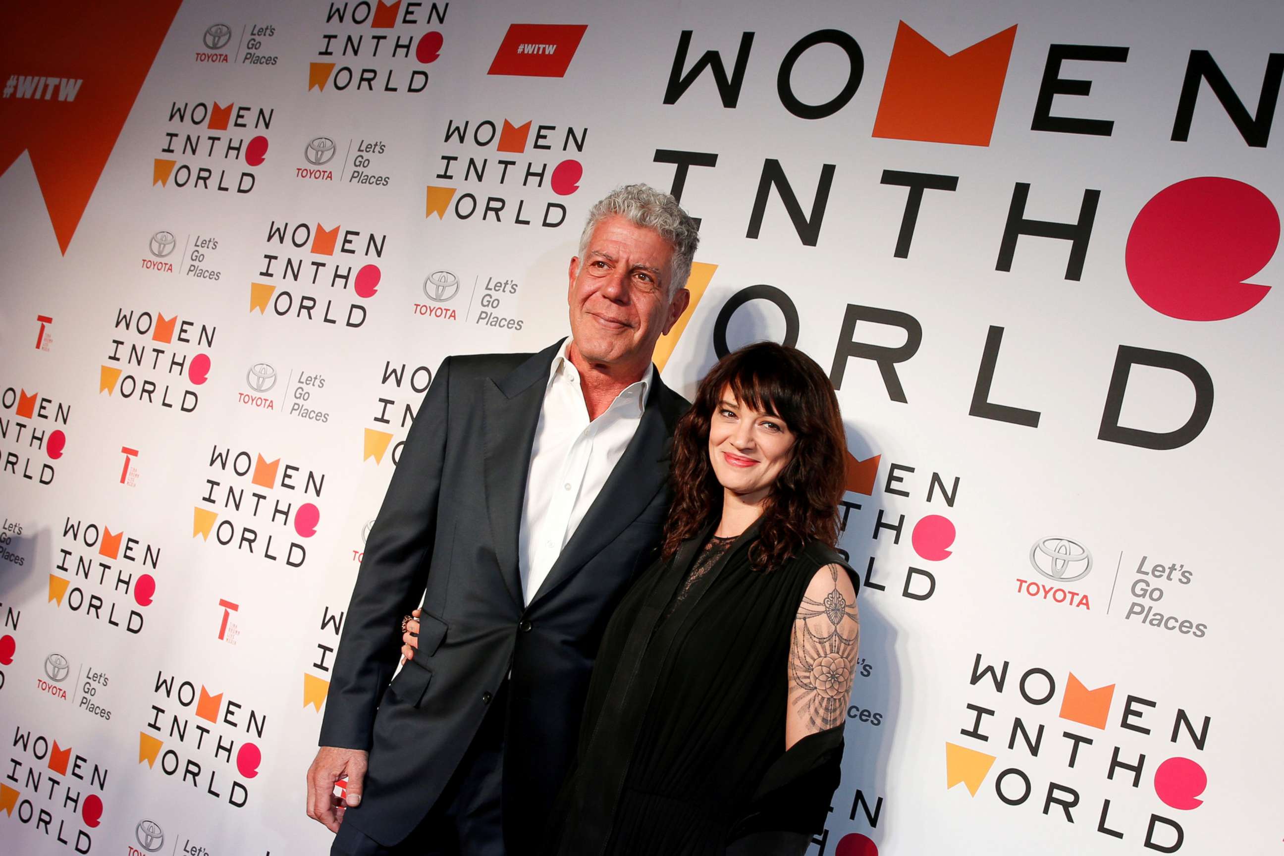 PHOTO: Anthony Bourdain poses with Italian actor and director Asia Argento for the Women In The World Summit in New York, April 12, 2018.