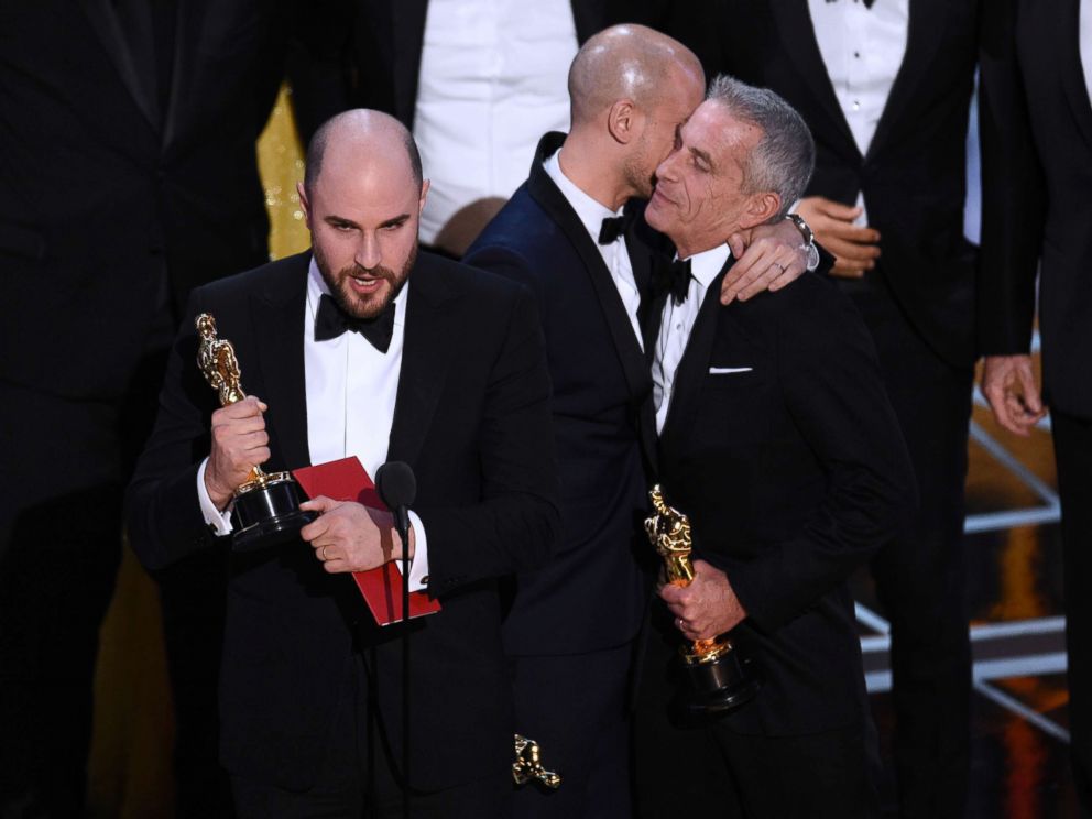 PHOTO: Jordan Horowitz, left, of "La La Land," mistakenly accepts the award for best picture at the Oscars on Sunday, Feb. 26, 2017, in Los Angeles.