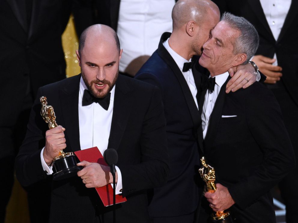 PHOTO: Jordan Horowitz, left, of "La La Land," mistakenly accepts the award for best picture at the Oscars on Sunday, Feb. 26, 2017, in Los Angeles.
