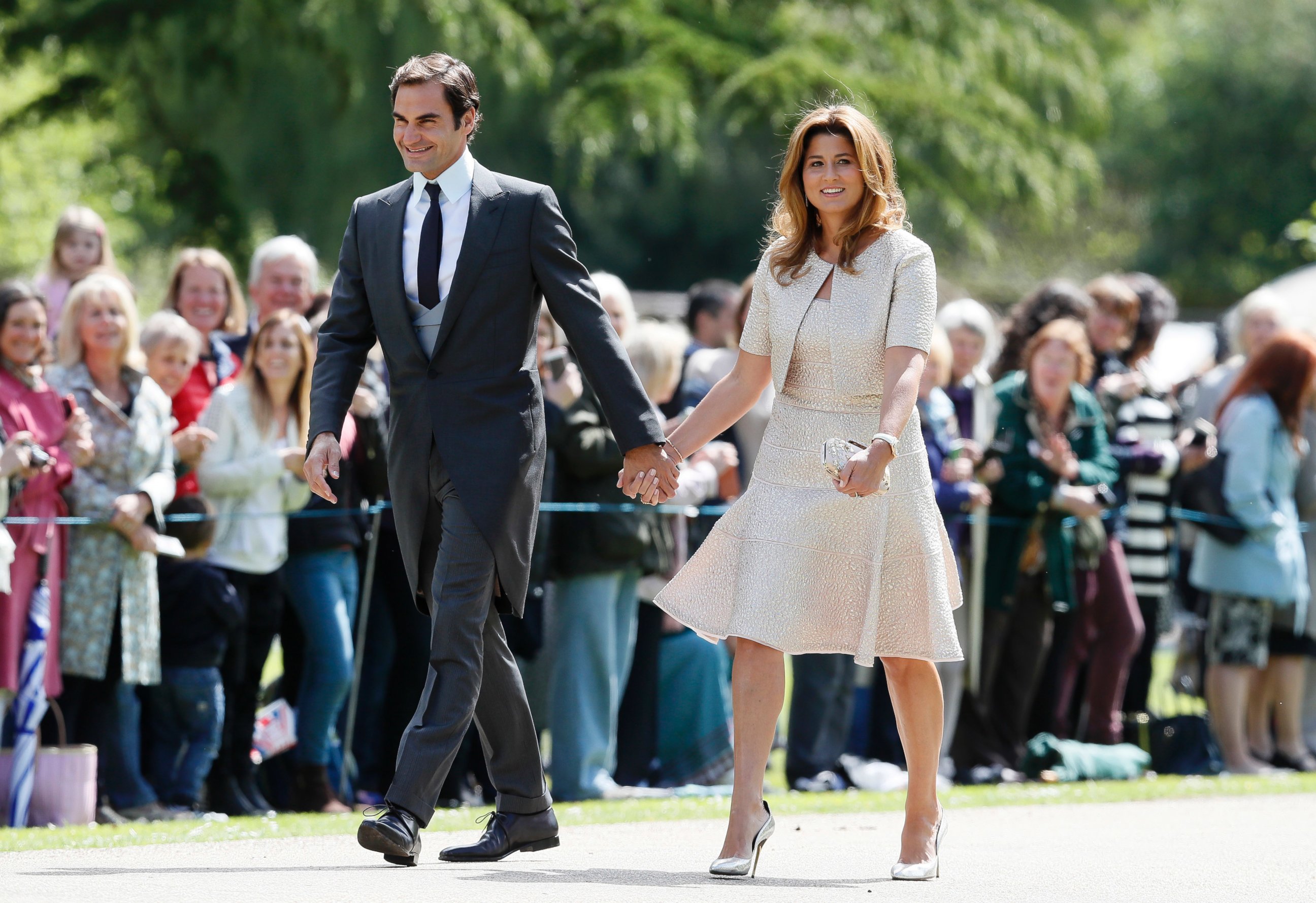 PHOTO: Swiss tennis player Roger Federer and his wife Mirka arrive at St Mark's Church in Englefield, England, ahead of the wedding of Pippa Middleton and James Matthews, May 20, 2017.