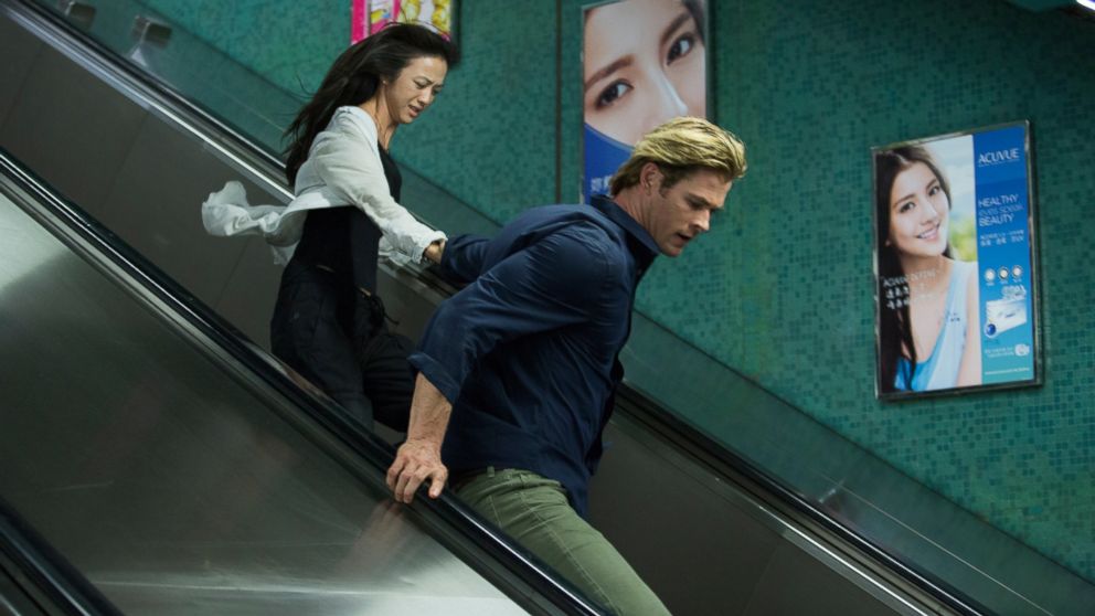 This photo provided by Universal Pictures shows, Tang Wei, left,  as Chen Lien, and Chris Hemsworth, as Nicholas Hathaway in Legendary?s film, "Blackhat," from director/producer Michael Mann. 