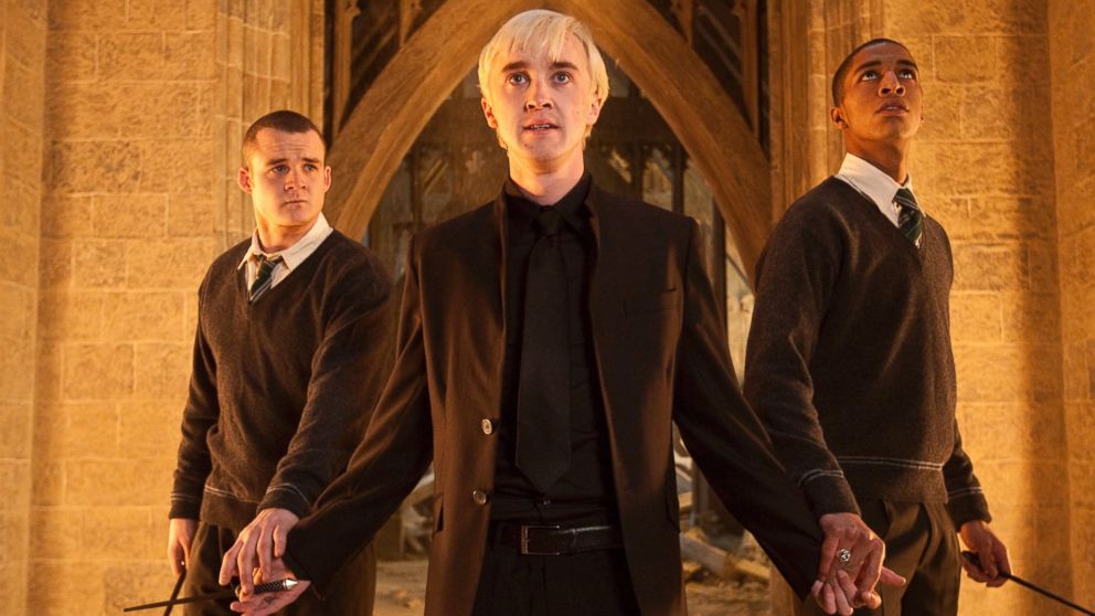 From left, Josh Herdman portrays Gregory Goyle, Tom Felton portrays Draco Malfoy and Louis Cordice portrays Blaise Zabini in a scene from "Harry Potter and the Deathly Hallows: Part 2." 