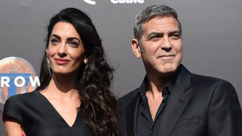 Amal Clooney and George Clooney arrive at the world premiere of "Tomorrowland" at AMC Downtown Disney, May 9, 2015, in Anaheim, Calif. 