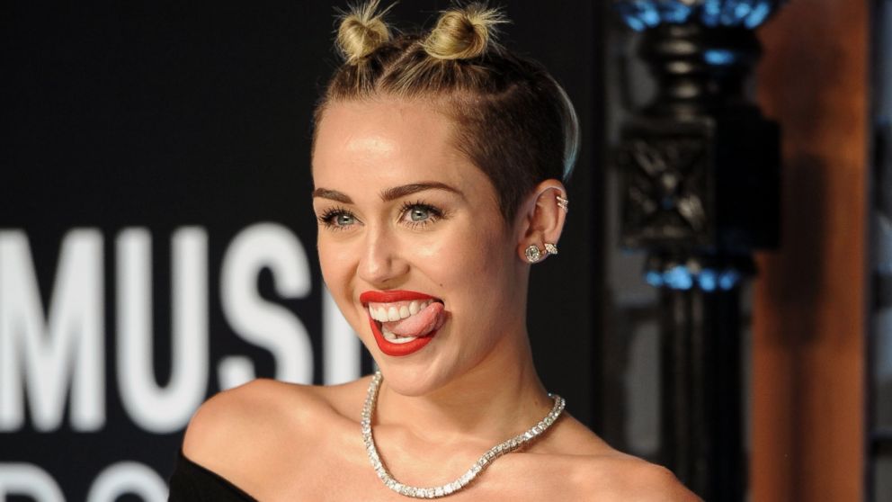 Miley Cyrus arrives at the MTV Video Music Awards in the Brooklyn borough of New York, Aug. 25, 2013.