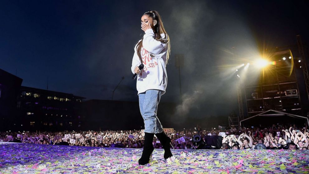 Ariana Grande wipes away a tear as she performs on stage during the One Love Manchester Benefit Concert at Old Trafford Cricket Ground on June 4, 2017 in Manchester, England.