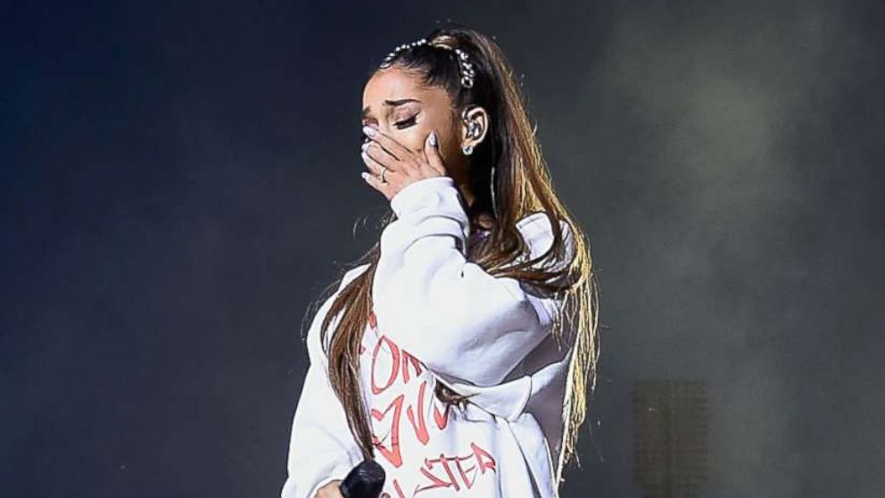 PHOTO: Ariana Grande wipes away a tear as she performs on stage during the One Love Manchester Benefit Concert at Old Trafford Cricket Ground on June 4, 2017 in Manchester, England.