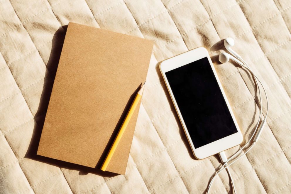 PHOTO: Journals and audio books can be relaxing activities when traveling. 