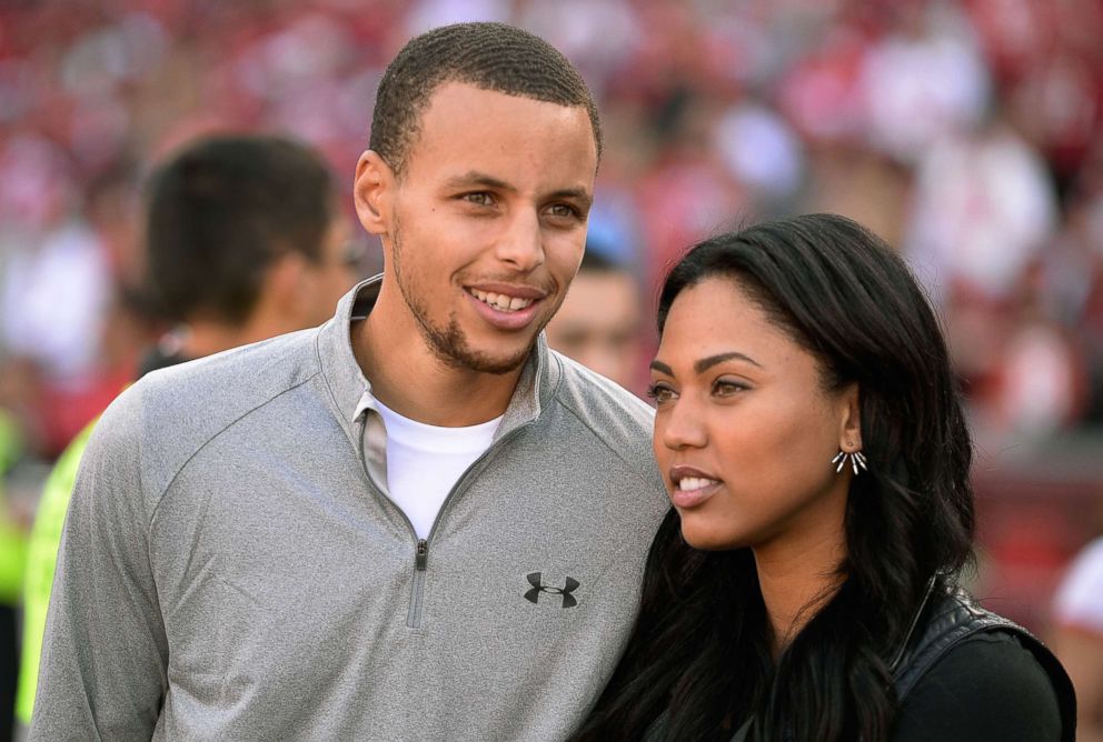 PHOTO: Stephen Curry and his wife Ayesha attend an NFL Game at Candlestick Park, Nov. 10, 2013 in San Francisco.