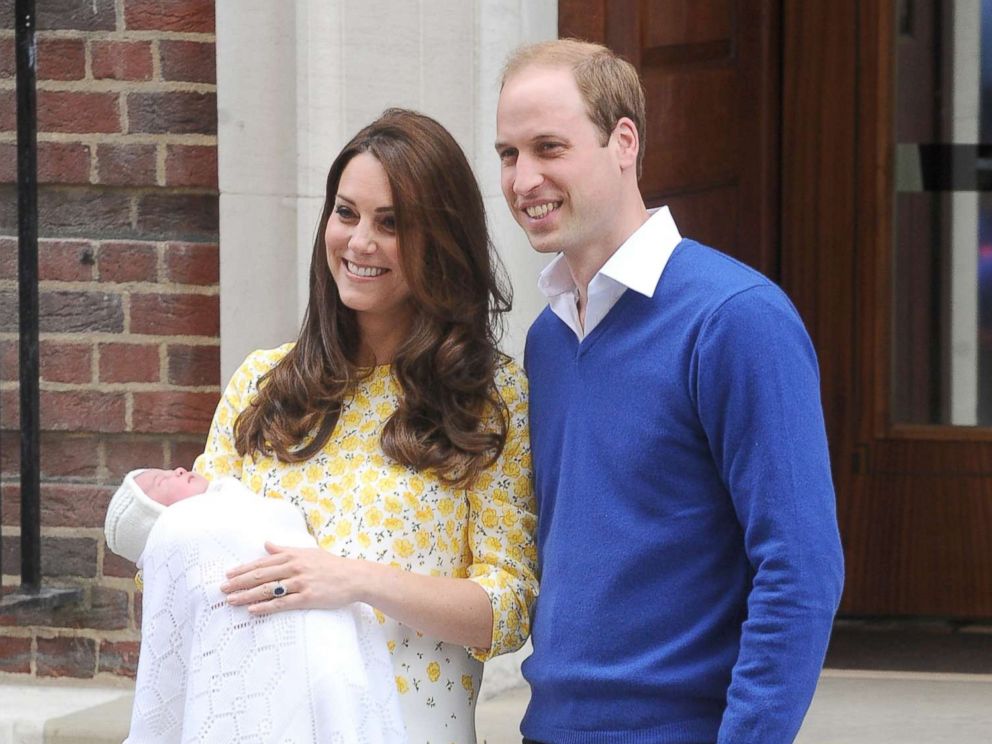 PHOTO: Prince William, Duke of Cambridge and Catherine, Duchess of Cambridge show off their new arrival, Princess Charlotte to the world outside the Lindo Wing of St. Marys Hospital, May 2, 2015, in London.