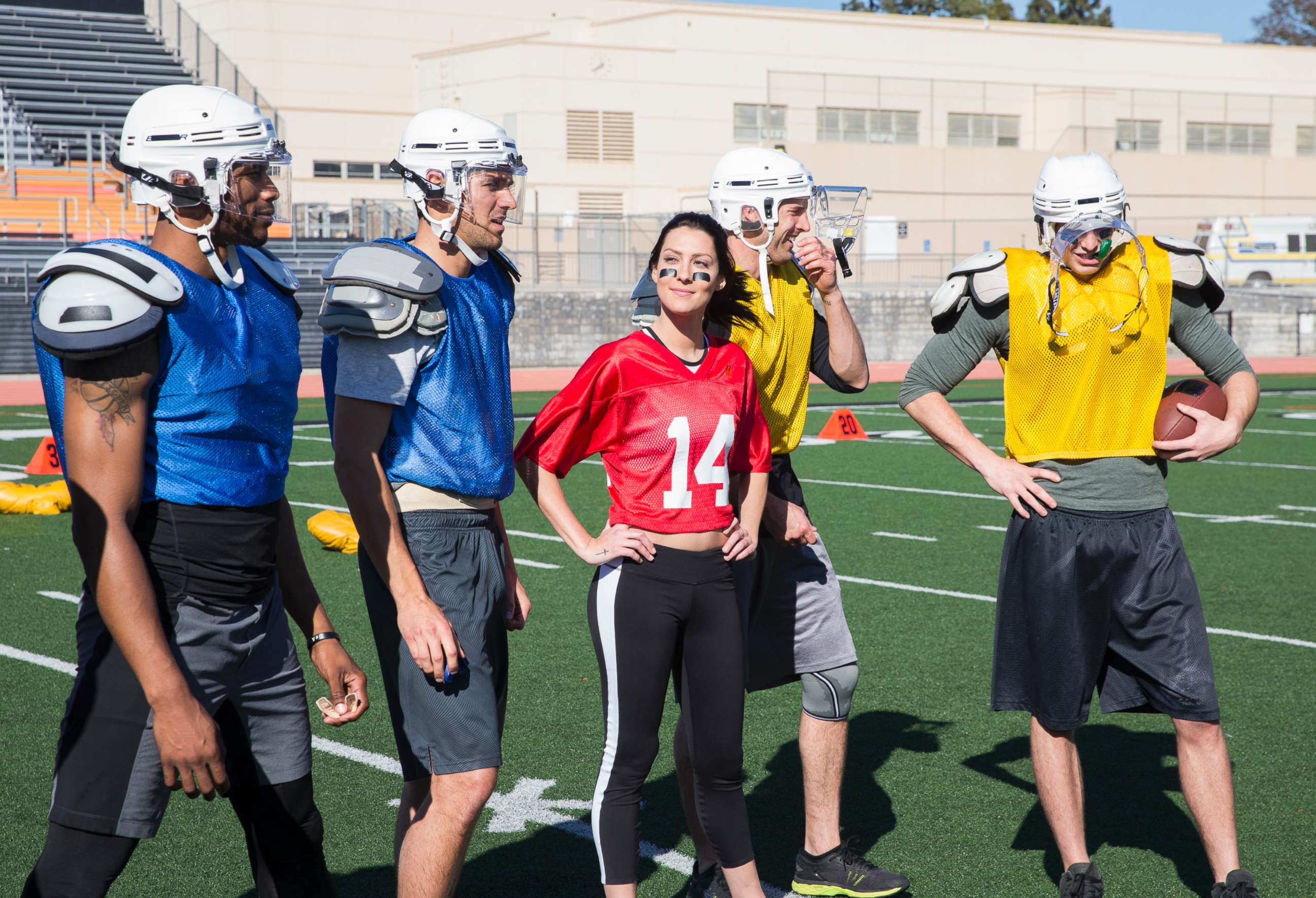 PHOTO: Christon, Ryan, Garrett and Blake meet Becca Kufrin at a football field to run drills with professional Legends Football League stars and then play a lively game, on "The Bachelorette," June 11, 2018, on The ABC Television Network.