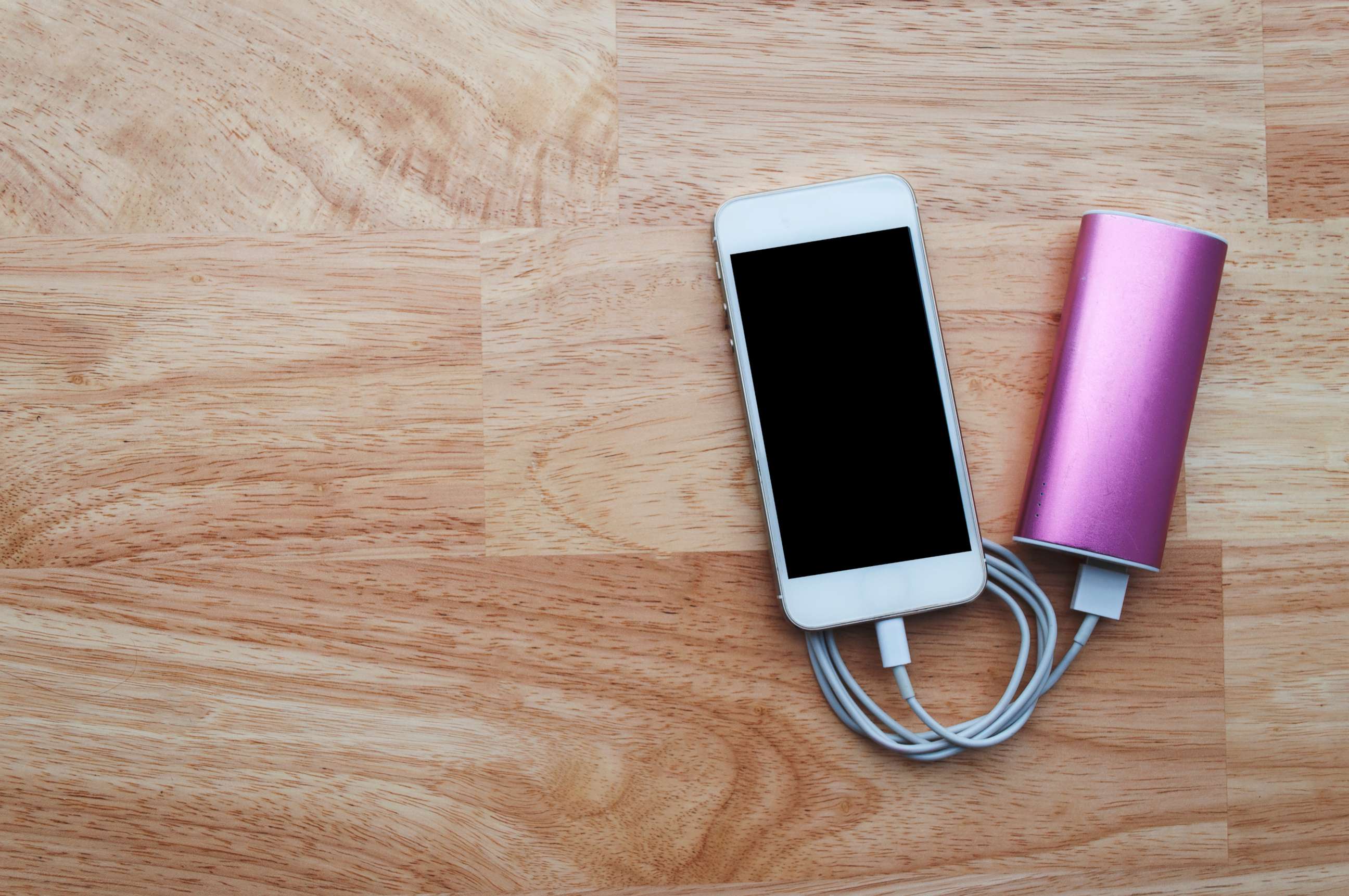 PHOTO: A smart phone is attached to a portable battery charger in this undated stock image.