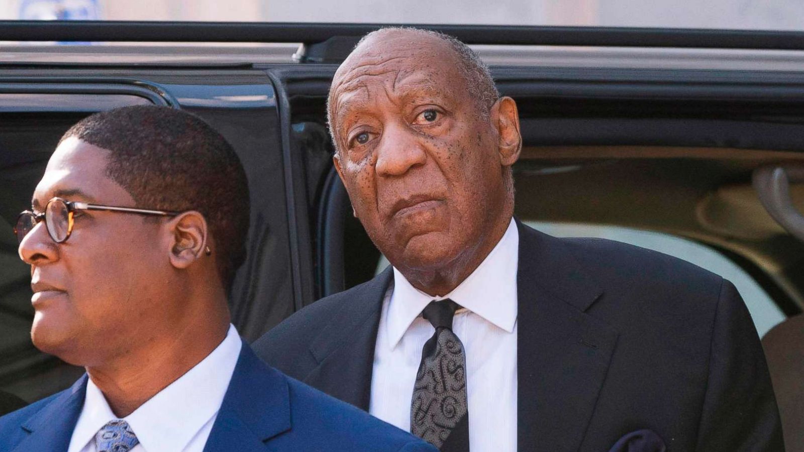 PHOTO: Bill Cosby pauses to listen to a heckler, as he arrives at the Montgomery County Courthouse March 6, 2018 in Norristown, Pa.