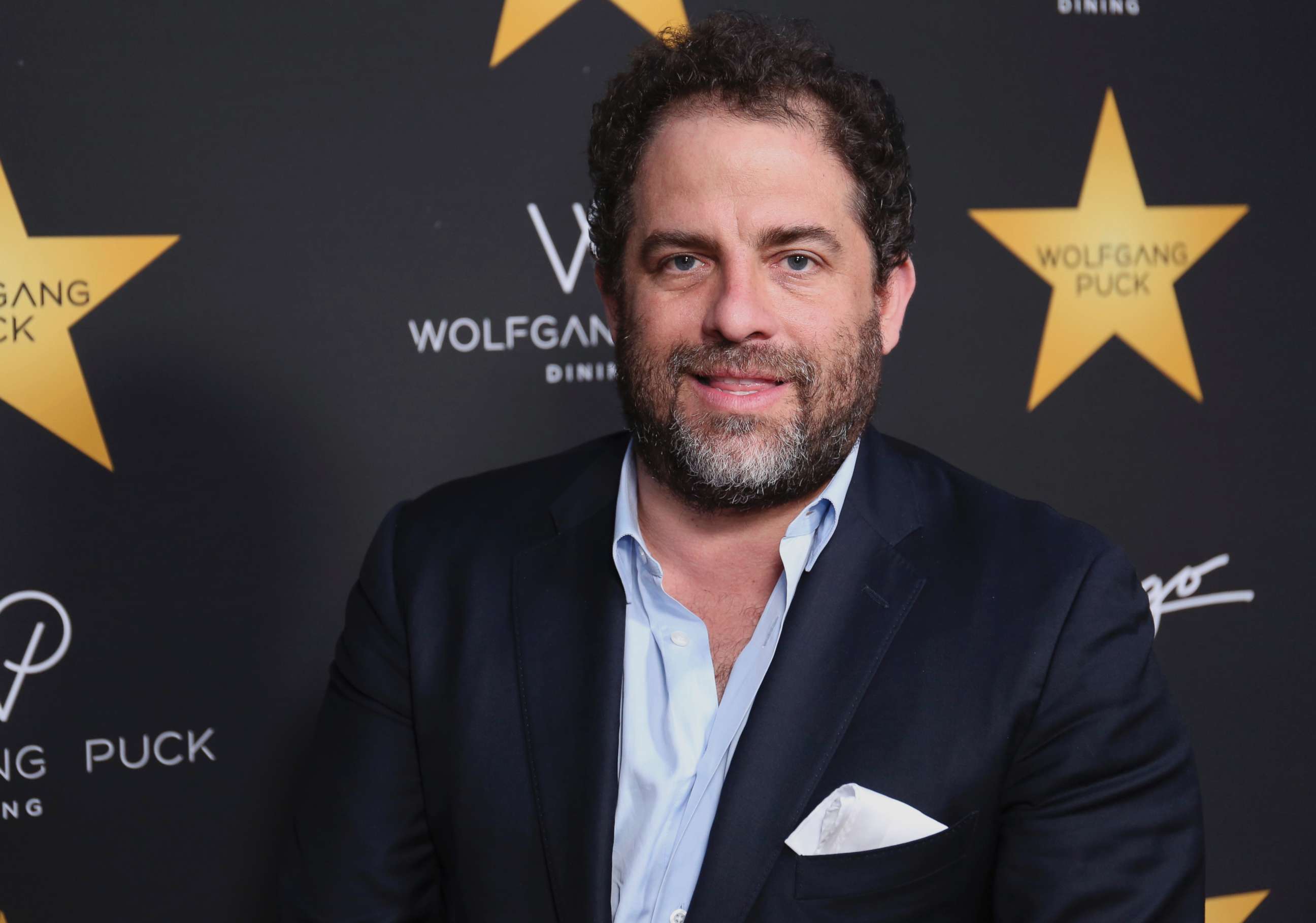 PHOTO: Brett Ratner arrives at the Wolfgang Puck's Post-Hollywood Walk of Fame Star Ceremony Celebration in Beverly Hills, California, April 26, 2017.  