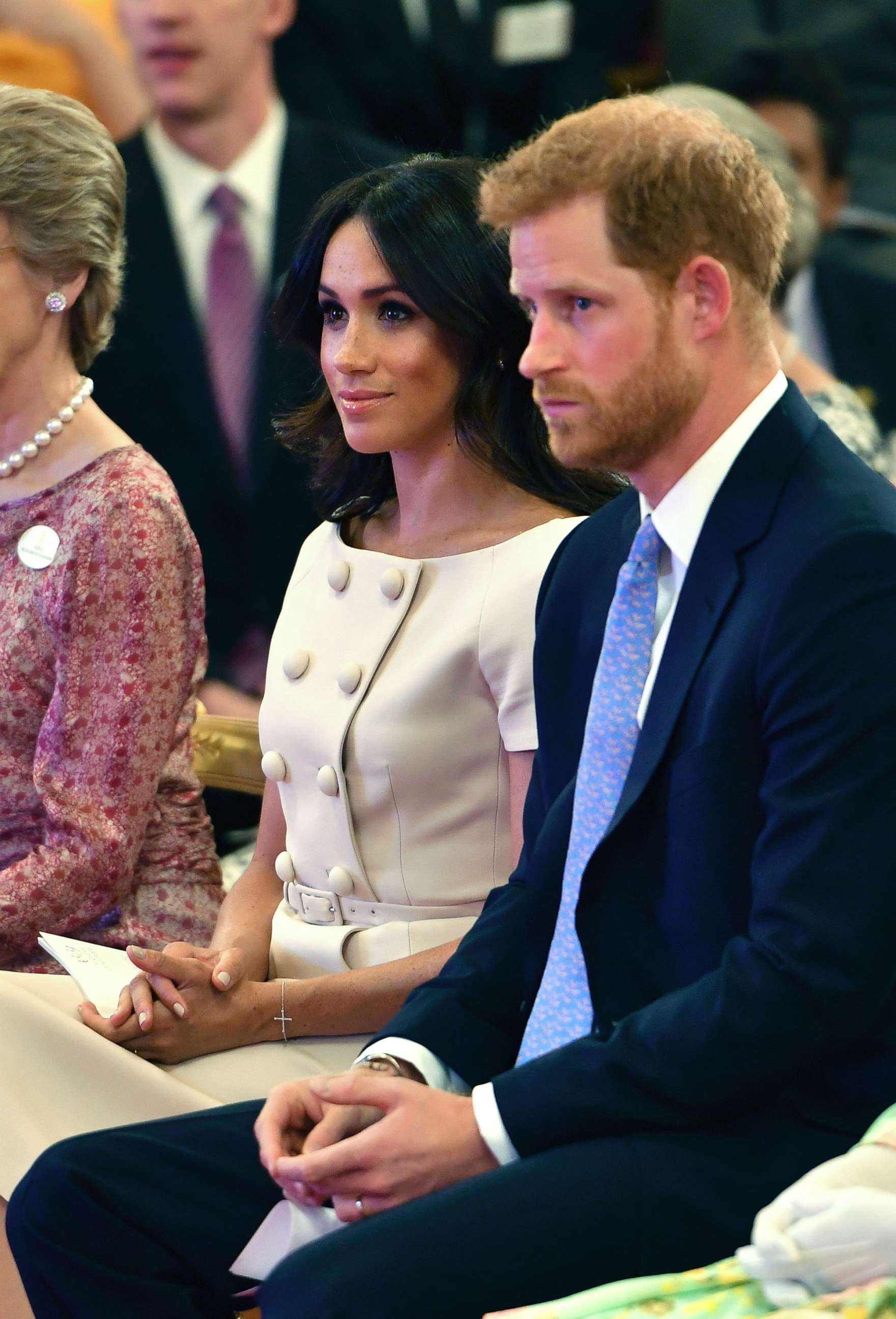 PHOTO: Britain's Prince Harry and Meghan, Duchess of Sussex attend the Queen's Young Leaders Awards ceremony at Buckingham Palace in London, June 26, 2018.