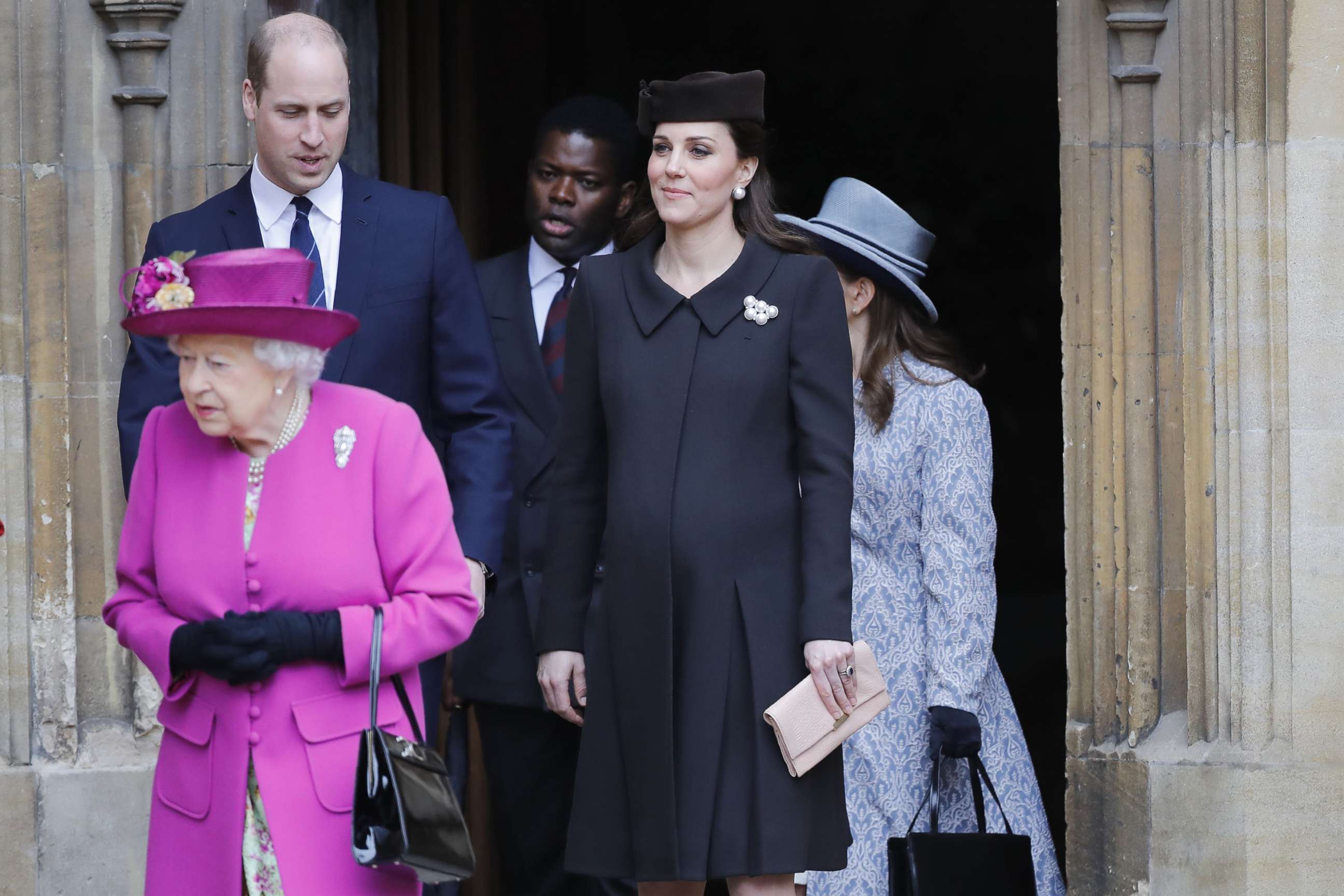 PHOTO: Britain's Queen Elizabeth II, with Prince William and Kate, Duchess of Cambridge, leave the annual Easter Sunday service at St George's Chapel at Windsor Castle in Windsor, England, April 1, 2018.