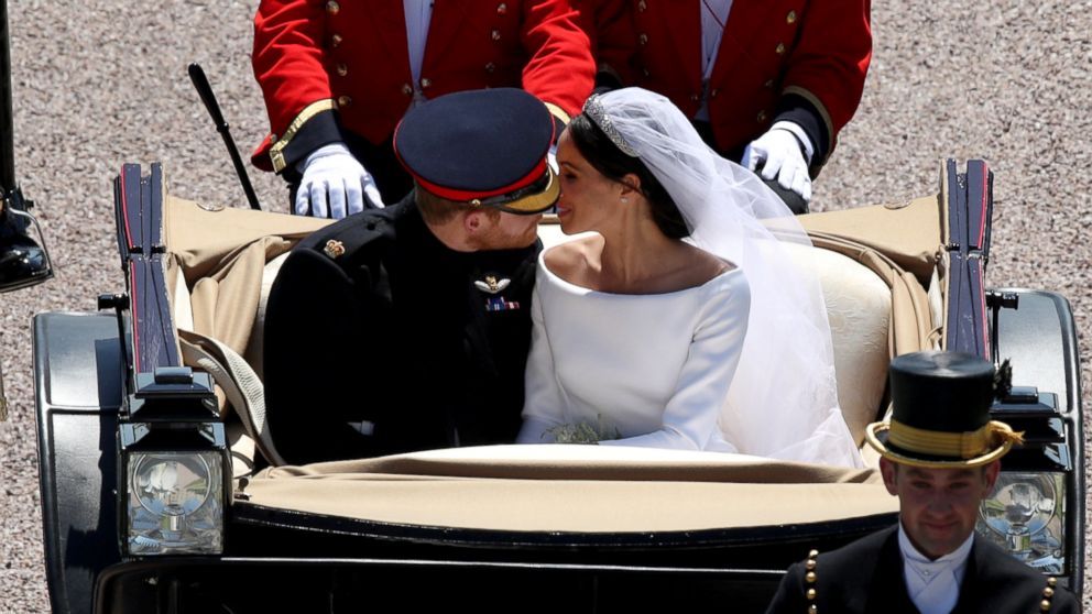 PHOTO: Prince Harry and Meghan Markle ride in an Ascot Landau along the Long Walk after their wedding in St George's Chapel in Windsor Castle in Windsor, May 19, 2018.